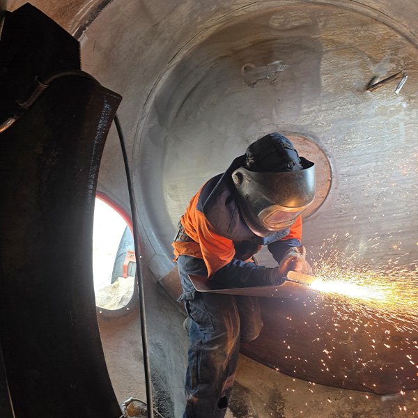 Repairs to concrete truck barrel.
