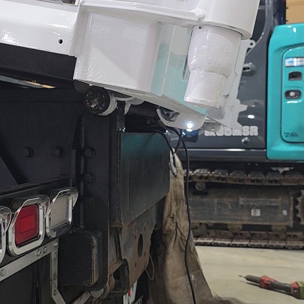 New towing hitch for a tip truck.