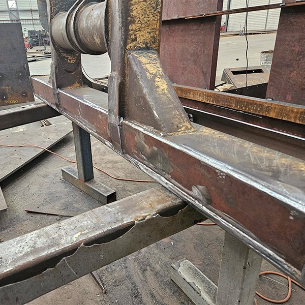 Repair to steel blade for a excavator.