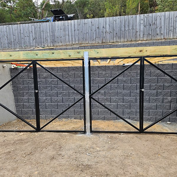 Custom steel gate fabrication for a storage area.