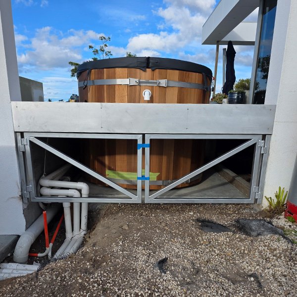 Custom aluminium gates for outdoor area and sauna.