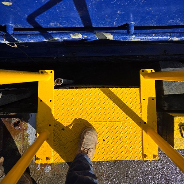 Safety access ladder for a marine pontoon.