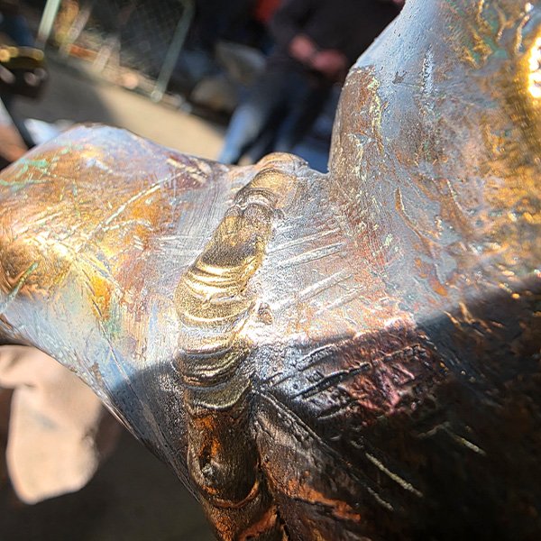 Welding repair to custom brass artwork.