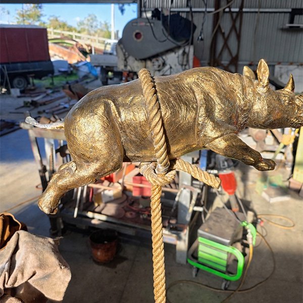 Welding repair to custom brass artwork.